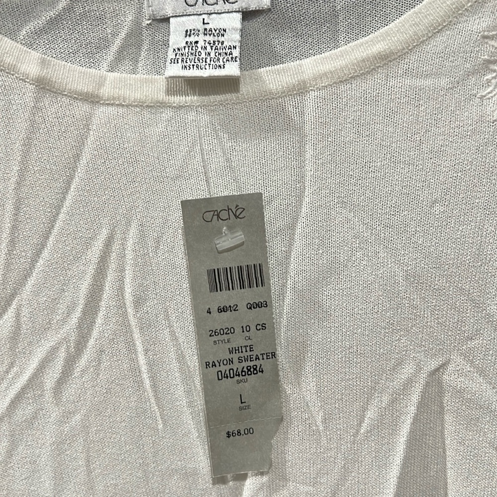 Ivory Cache blouse fitted stretchy 62 percent rayon 38% nylon scallopped style